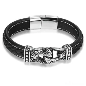 Men's gothic leather bracelet top-down view showing embossed stainless steel buckle and magnetic clasp on genuine leather strap