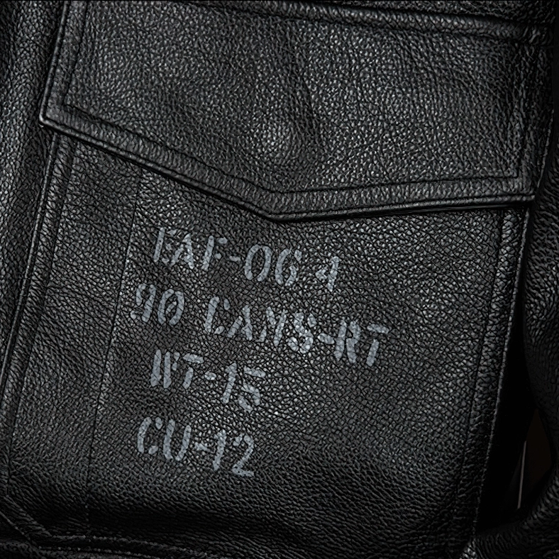 Men's black gothic leather jacket side view showing full sleeve length and ribbed cuff construction