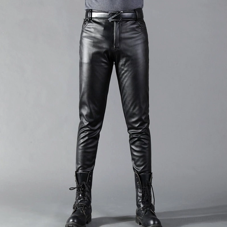 Men's black slim gothic leather pants with mid-rise fit, front view on model wearing combat boots and matching leather belt