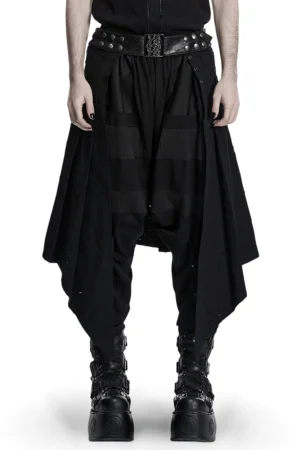Men's gothic asymmetrical punk skirt with studded metal belt worn by model front view on white background
