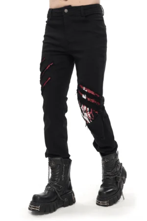 Men's gothic distressed ripped trousers front left view with red graphic print detail on black fitted pants