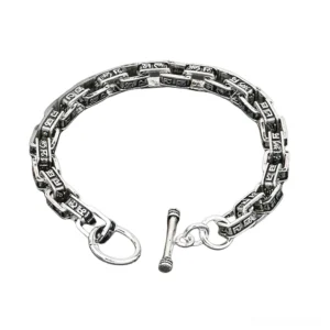 Men's S925 sterling silver gothic square mantra bracelet with carved link chain, front overhead view on white background