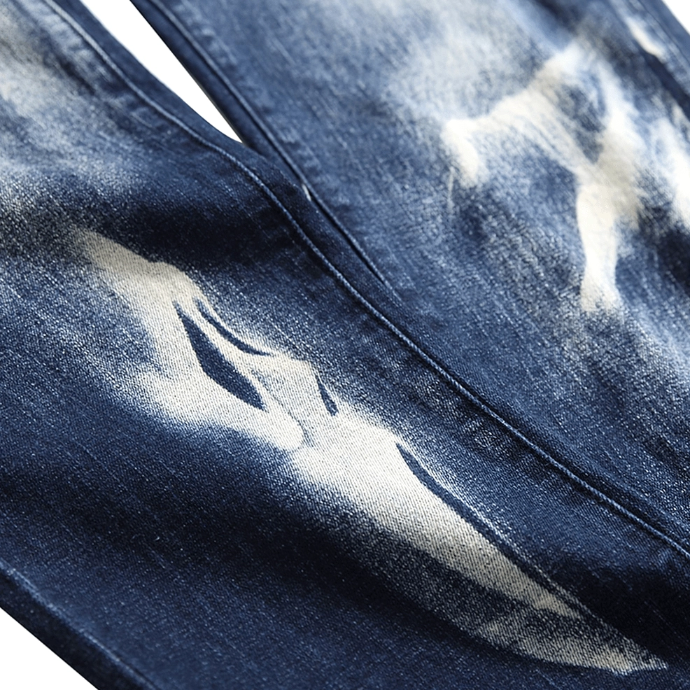 Men's gothic skull 3D print jeans detail shot showing dimensional graphics and fabric quality