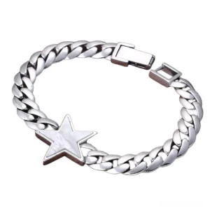 Men's sterling silver gothic bracelet with five-pointed star charm and Cuban curb chain, top-down flat lay view