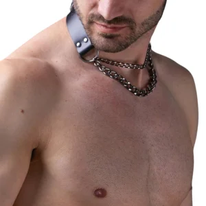Layered leather strap bondage harness with stacked metal chains, side profile view