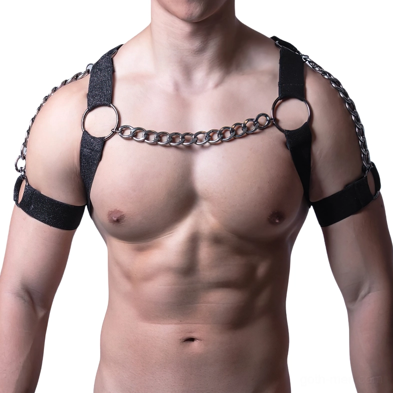 Men's black leather chest harness with metal chain straps and O-rings, front view on muscular male model, gothic body harness design