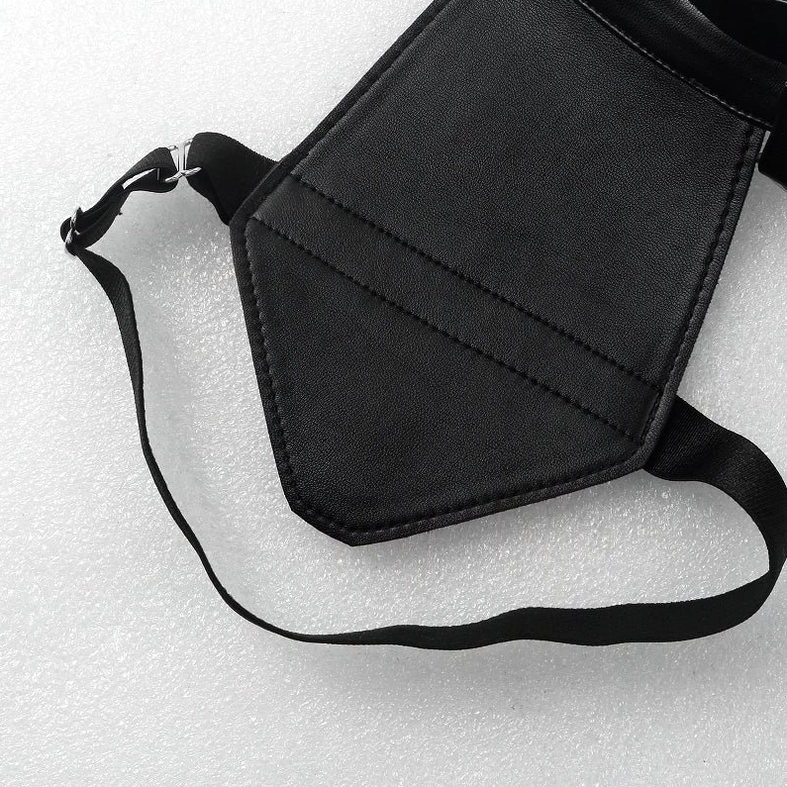 Flat lay front view of men's harness featuring neck choker and metal rivets construction details