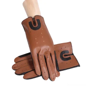Camel brown genuine sheepskin equestrian gloves displayed on wooden mannequin hands, showing perforated ventilation holes and black decorative patches