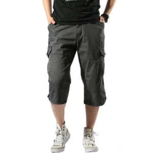 Men's dark grey tactical cargo capri shorts front view with multiple cargo pockets and drawstring hem cuffs
