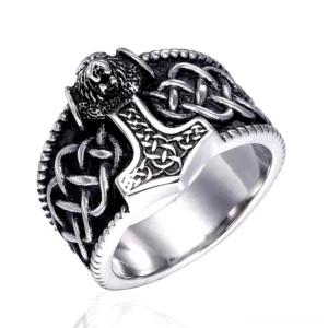 Thor's Hammer Mjolnir ring oblique side angle - polished inner band with engraved Norse symbols and intricate knot designs on dark patina background