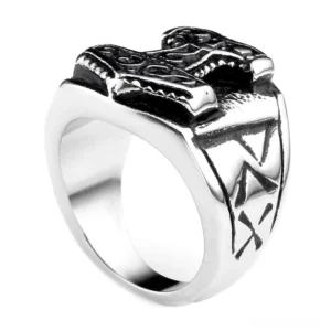 Viking Mjolnir signet ring top front angle displaying polished hammer motif and detailed rune side engravings in stainless steel