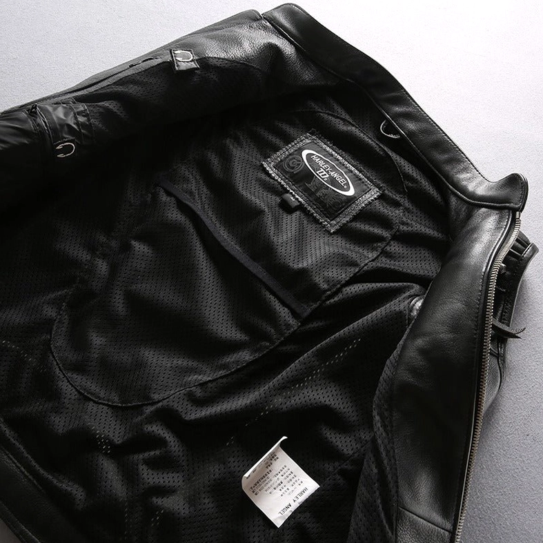 Side view of model in black genuine leather biker vest showing shoulder and side silhouette