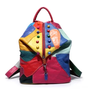 Multicolor patchwork leather Gothic backpack with metal studs and colorful panels, front view