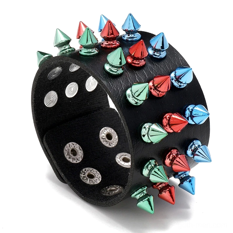 Multicolor three-row spike gothic leather cuff bracelet top view with red blue and green metal cone spikes on black PU leather