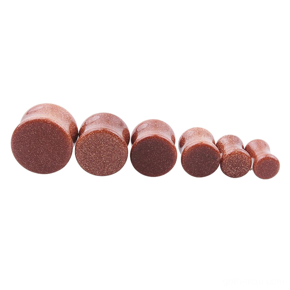 Small to medium golden sand stone ear flesh tunnels - gothic gauge expanders side view showing polished finish and natural earthy brown tones