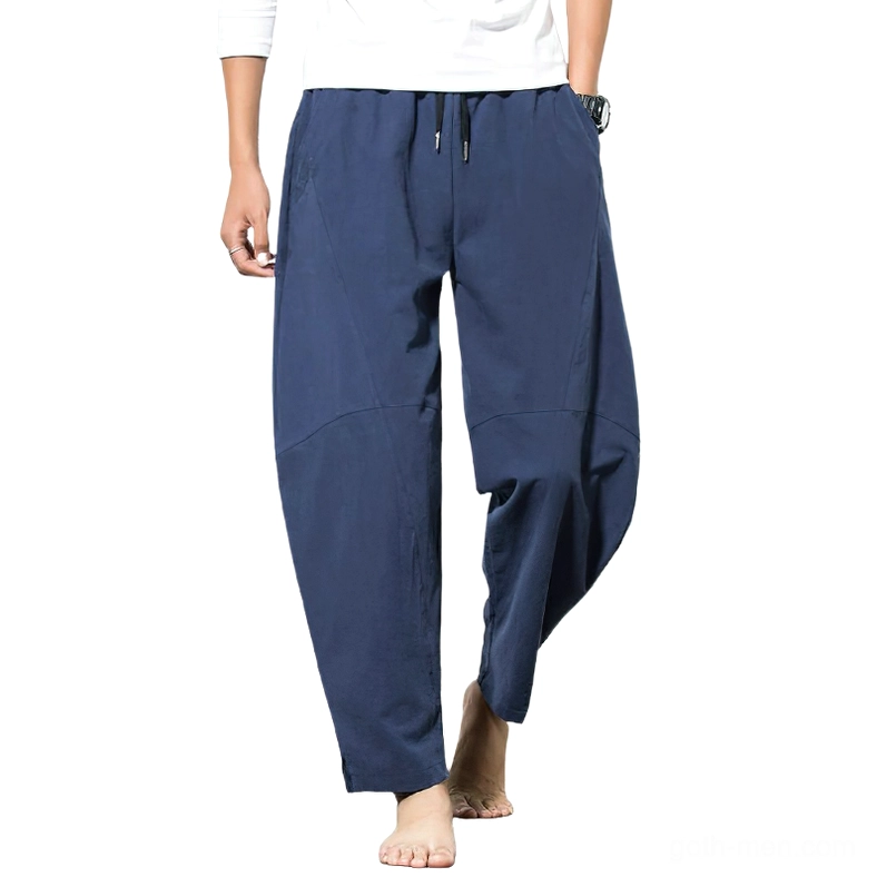 Navy blue linen harem pants front view with drawstring waist worn on model