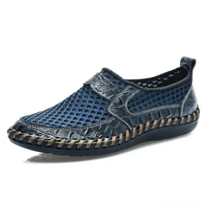 Navy blue slip-on loafers with mesh upper and hand-stitched sole, gothic casual shoe design