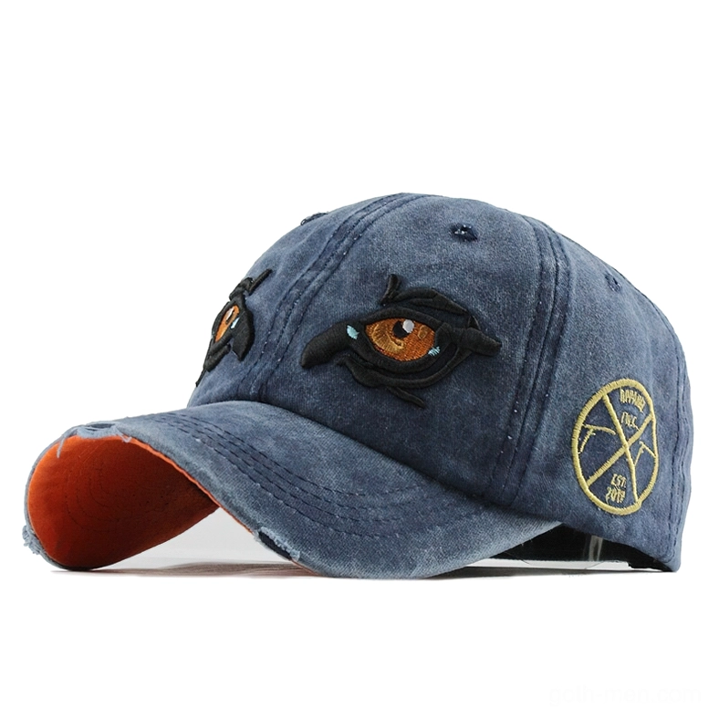 Navy blue washed gothic eagle cap with distressed brim and embroidered eagle eye, front view