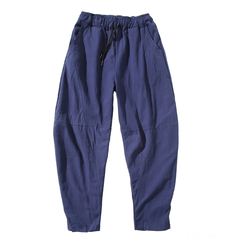 Navy blue gothic harem pants front flat lay showing drawstring waist and tailored seams