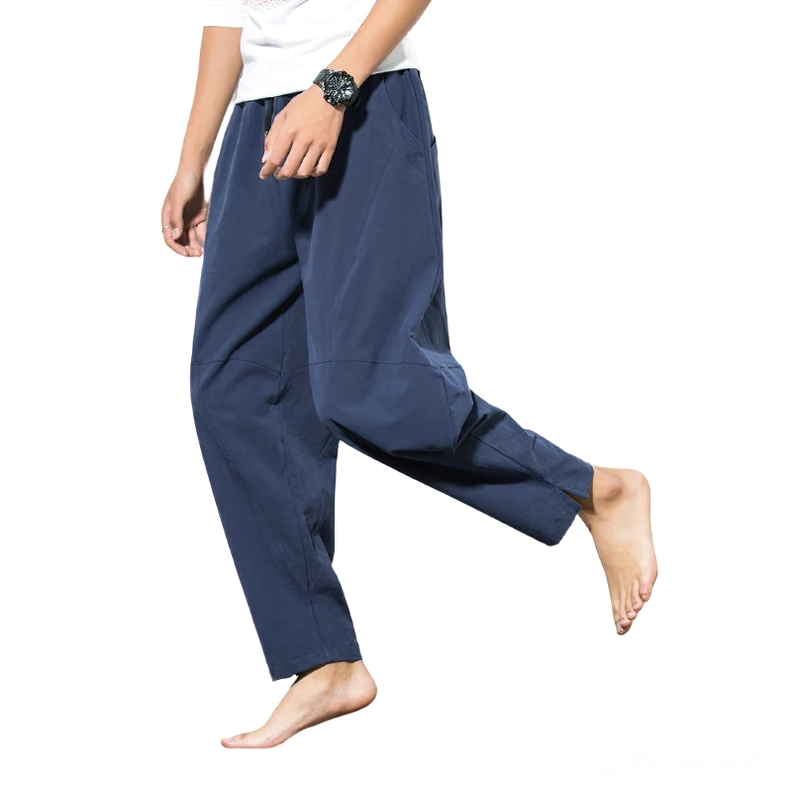 Navy blue gothic harem pants side profile demonstrating loose casual fit and drape