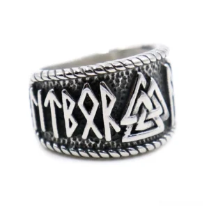 Nordic Valknut rune stainless steel gothic ring front oblique view with twisted rope border and dark patina finish