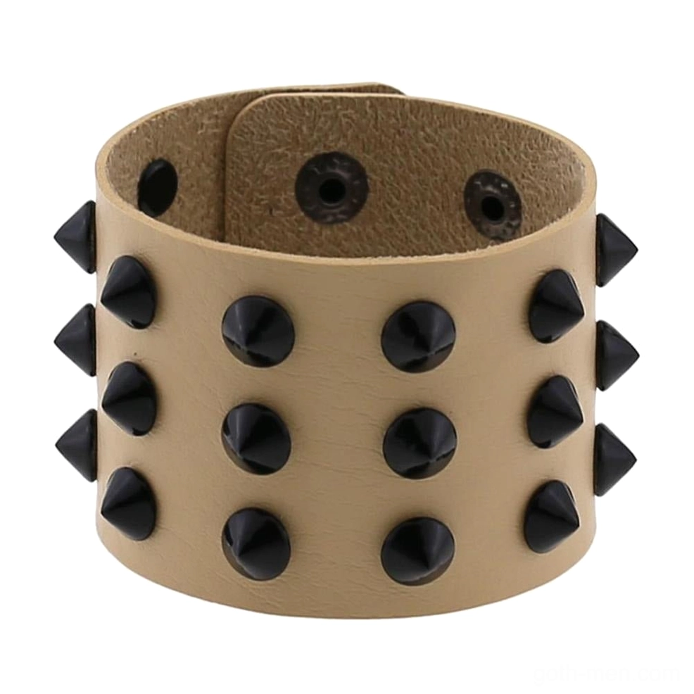 Nude beige vegan leather spike bracelet front view featuring triple cone spike arrangement