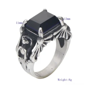 Winged gothic ring profile showing 13mm band width and square black gemstone mounting detail from side angle