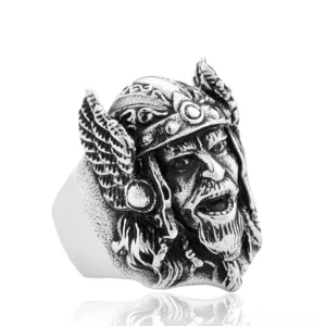 Odin Viking warrior head gothic ring, left three-quarter view showing detailed carved bearded face and vintage silver stainless steel finish