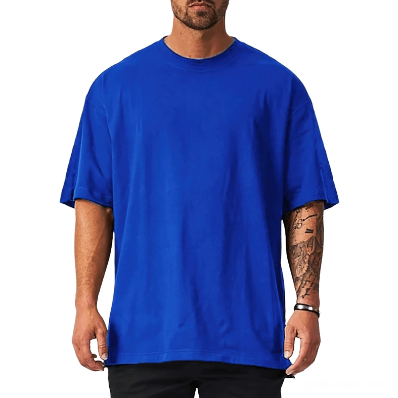 Royal blue oversized gothic crew neck tee with dropped shoulders on tattooed male model