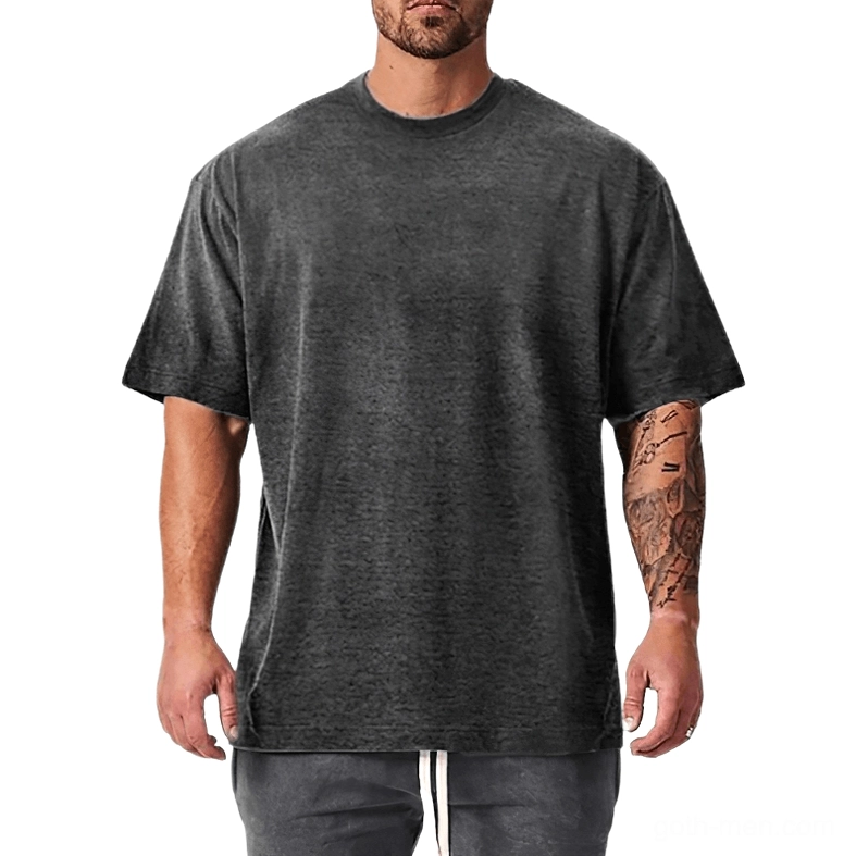 Heather grey oversized gothic t-shirt with dropped shoulder silhouette on tattooed model