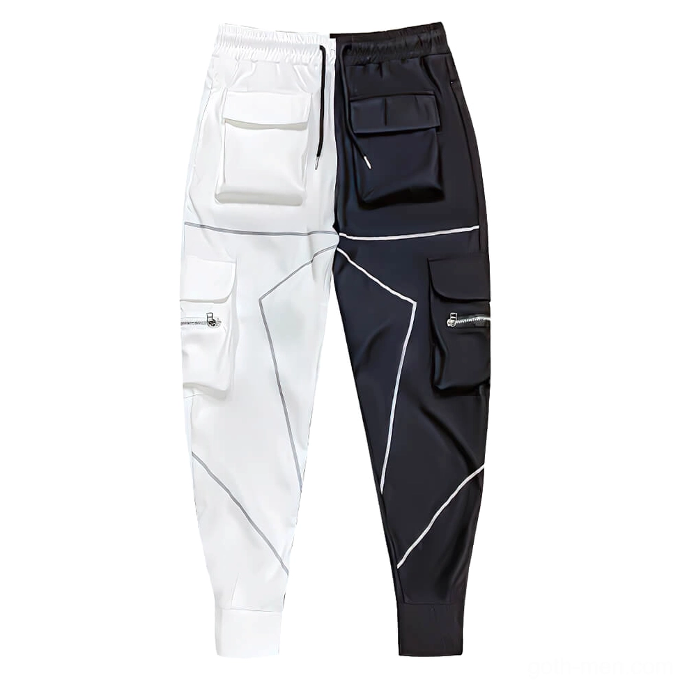 Black and white patchwork cargo joggers flat lay featuring dual-tone color block design and reflective trim