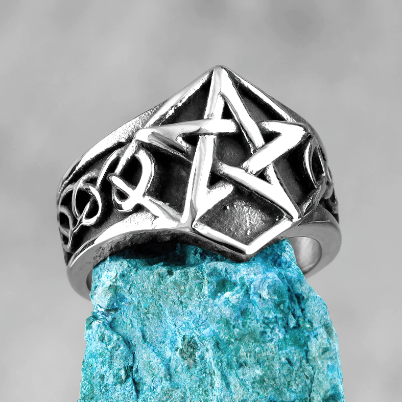Pentagram ring overhead close-up view on turquoise gemstone showing bold five-pointed star motif