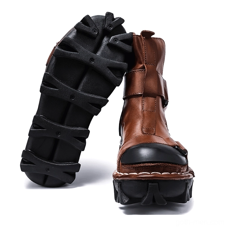 Perforated leather vamp combined with solid leather sections on gothic punk ankle boots - design highlight