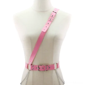 Pink gothic PU leather one-shoulder harness with silver chain tassels and metal accents, front display