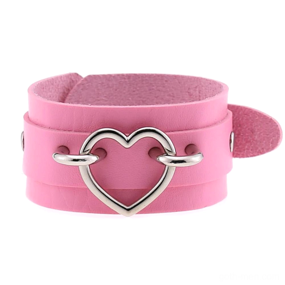 Pink double-layer leather heart cuff bracelet with silver hollow heart buckle, alternative fashion jewelry flat lay
