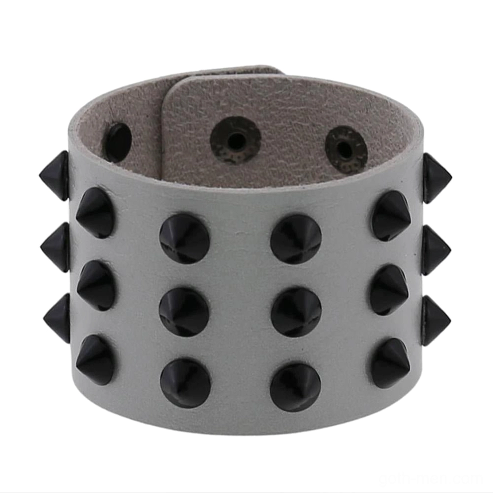Pink vegan leather spike studded wrap bracelet front view showing full spike detail