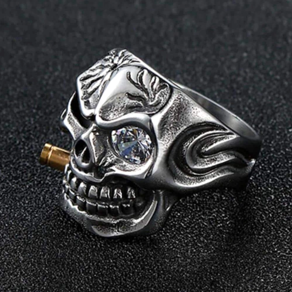 Gothic skull biker ring dark background front view with flame engraving and vintage skull texture detail