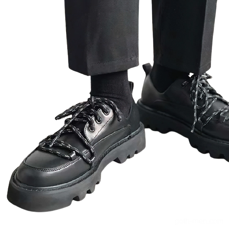 Black gothic platform shoes on-foot styling with formal trousers and dark socks alternative look