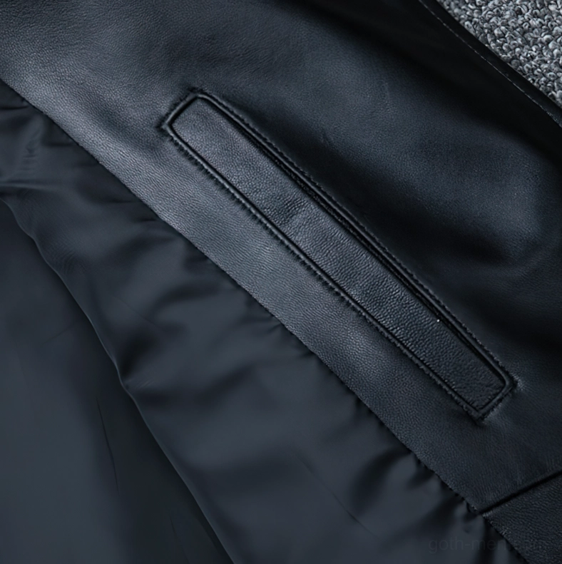 Black sheepskin leather jacket close-up showing premium material quality and refined gothic biker design