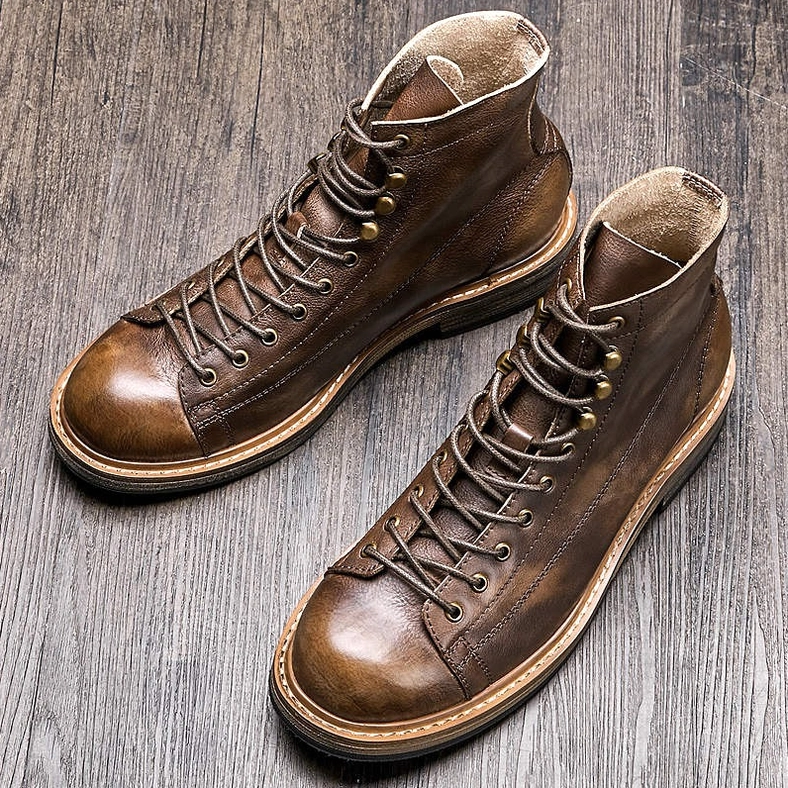 Premium men's gothic lace-up ankle boots in genuine cow leather with round toe and lace-up closure system detail