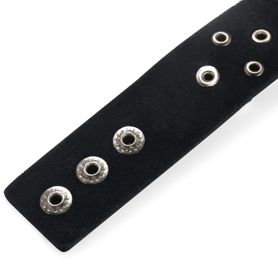 Flat lay punk gothic bracelet with black leather strap cross charm and chain tassel