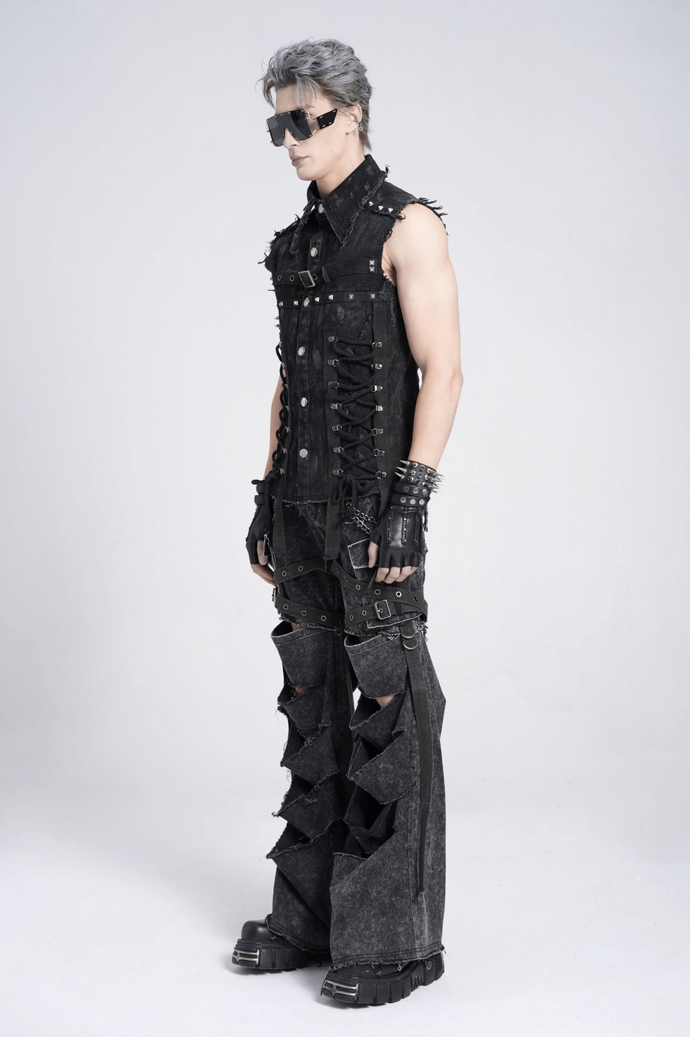 Punk goth denim shirt showcasing silver stud accents and distressed texture throughout fabric