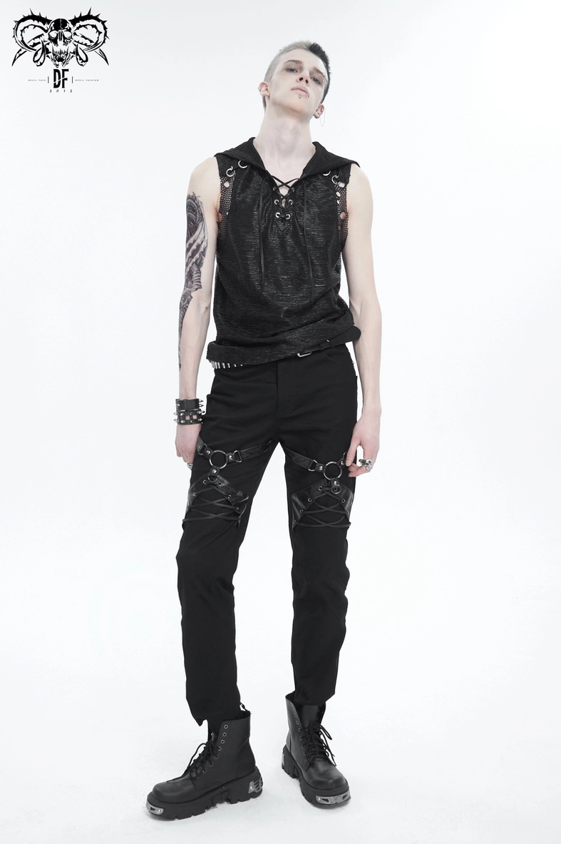 Black punk rock gothic pants on model displaying fitted silhouette and harness details