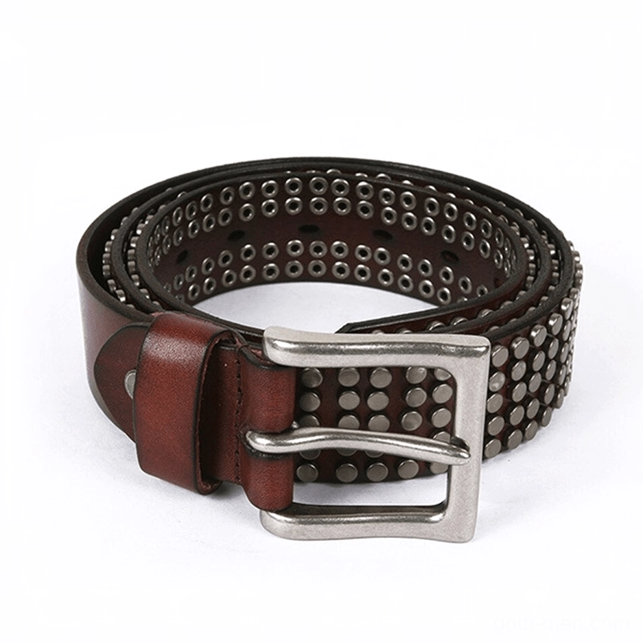 Textured leather belt with industrial metal rivets and punk aesthetic silver buckle