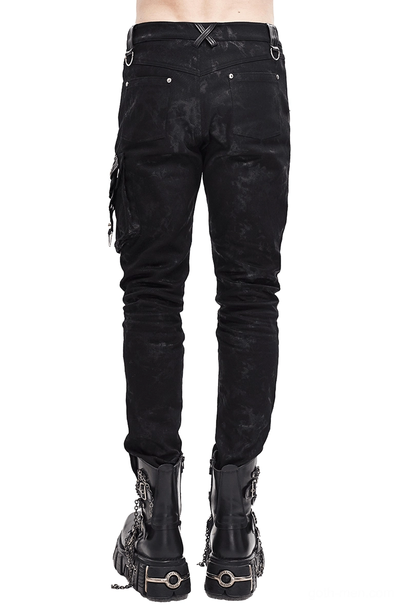 Black punk style leather pants rear view - asymmetric rivet detail and cargo pocket construction