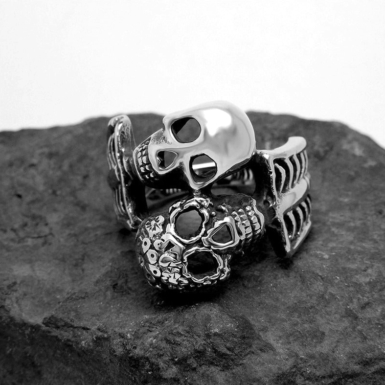 Double skull punk ring top view aged silver stainless steel darkened patina