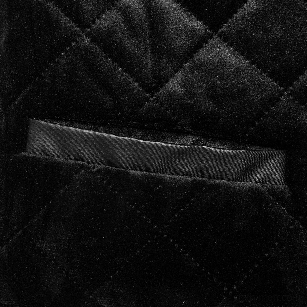 Gothic quilted waistcoat detail showing leather waist adjuster strap with metal hardware