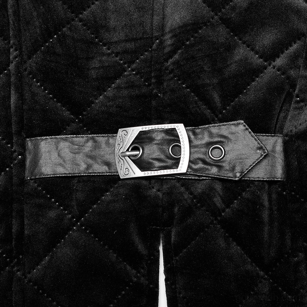 Detail shot of diamond quilted velvet texture and engraved metal buckle on gothic waistcoat