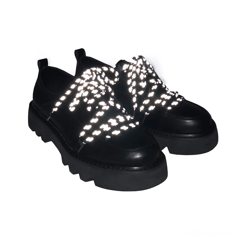 Men's black flatform casual shoes with star-shaped reflective braided laces and industrial tread sole