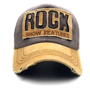 Distressed cotton ROCK cap featuring brown-grey crown with tan brim and embroidered patch detail
